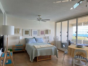Common area with mattress and dinning table
