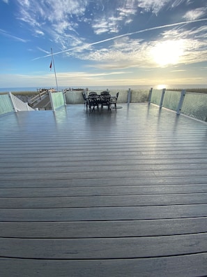 ocean view from 1st floor 1000 square foot deck with glass railing