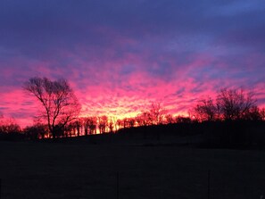 An explosive sunrise seen from the Sunroom's east windows