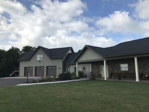 House with apartment over the garage, entrance is on the end of the garage