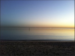 sunset an nearby Bon beach. 10 min by car or a nice bike ride.