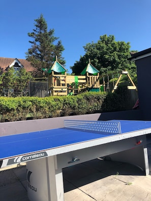 Outdoor table tennis, large trampoline and new climbing frame.