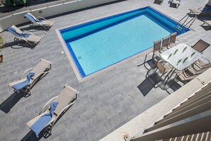 View of the pool and garden from the balcony