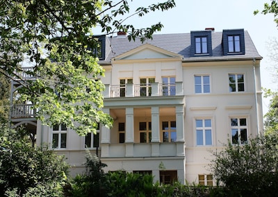 Spacious loft apartment in a villa with a garden in Potsdam