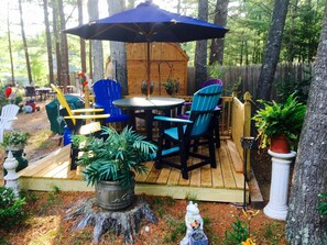 Outdoor patio deck with gas grill 