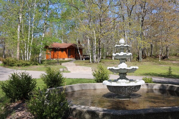 View of the cabin from the fountain