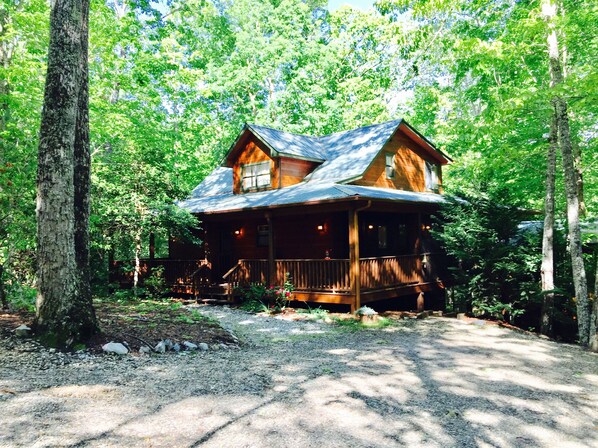 The cabin is set down a short driveway for privacy. 