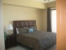 Master bedroom with sliders to the 40' deck, flat screen TV, DVD player 