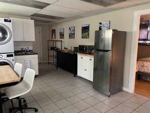 Main entrance, kitchen, dining, laundry area.
