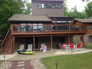 Back deck and lower patio area over looking lake and dock.