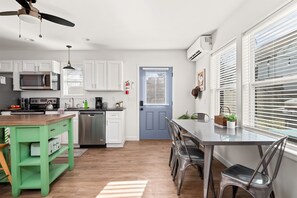 Well equipped kitchen and dining area.