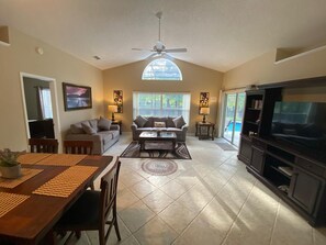 Great Room with separate seating and dining areas
