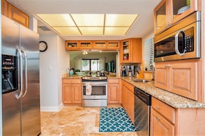 Spacious kitchen open to living room and dining room