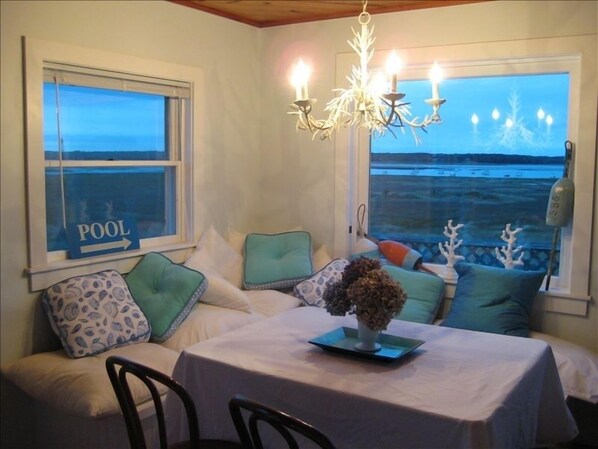 Dining area with sweeping water views of our inner harbor "The Pool"