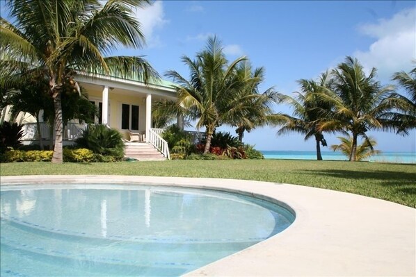 Welcome to our home! You have the beach on one side & the pool on the other!