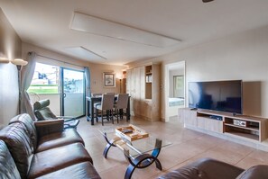 Living room space with second bedroom entrance