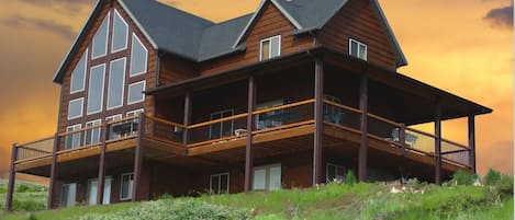 Cabin Exterior - Deck View. Cabin on Hill over looking the lake.
