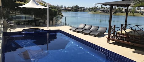 Heated pool, spa and shark free swimmable lake with sandy beach edge for kids