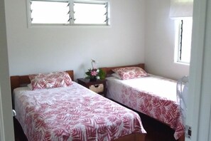 third bedroom with king single beds shares ensuite