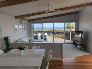 Ocean views through kitchen, dining, living areas