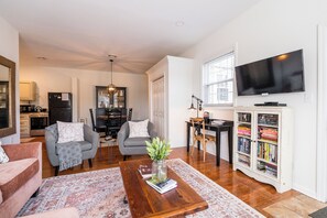 Flat screen tv with DVD player and plenty of reading material