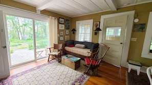 Living room with slider to front deck