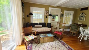Living room with slider to front deck