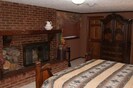 (North Quarter) room also has a fireplace and takes about 25% of the whole house