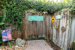 Come thru the mermaid gate to begin your vacation with us