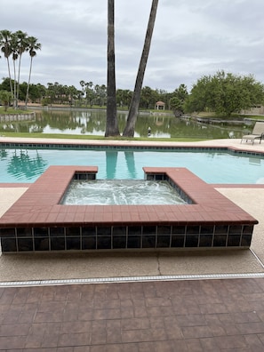 Heated pool, jetted hot tub, and lay out area! 