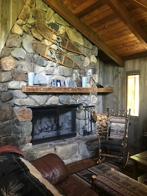 Beautiful fieldstone wood fireplace 