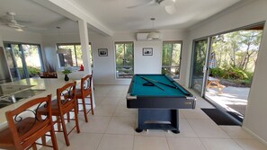Living, kitchen, games and BBQ patio