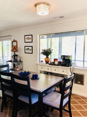 Dining area overlooking lake. 