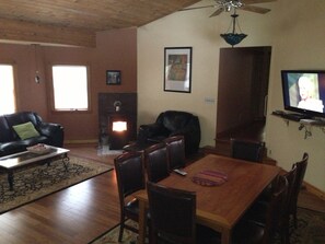 Family Room -  Table pulls out and seats 14, DirecTV, pellet stove