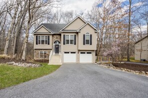 front of the house showing 2 driveways
