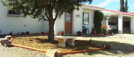 Welcome to Roadrunner Retreat's main entry, patio & carport