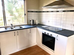 Appliances recently updated include oven, ceramic cooktop and microwave oven