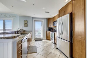 Kitchen with door to balcony