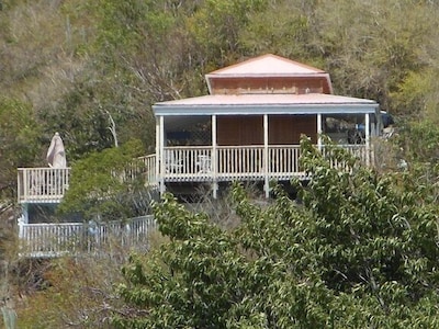 Built on two levels plus a loft, the retreat offers large decks and porches