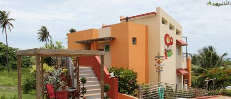 photo of building from parking lot: Fusion Beach Villas in Isabela, PR