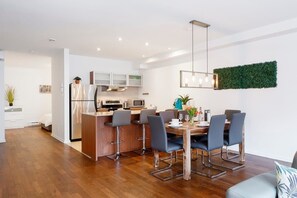 View from the open living space on the partially closed bedroom