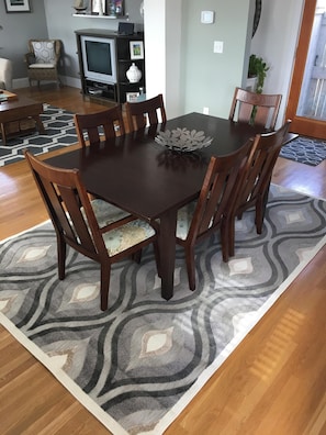 Ethan Allen dining table can accommodate sixcomfortably