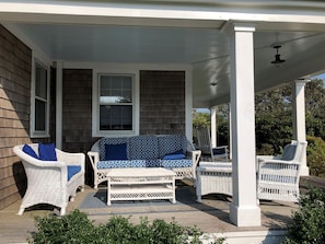 Wicker furniture provides a comfortable spot for morning coffee