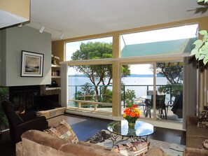 Ocean front living room with fireplace