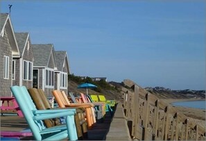 Unit #1 is the cottage behind the blue umbrella
