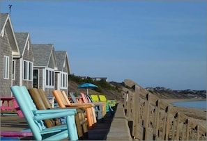 Unit #1 is the cottage behind the blue umbrella
