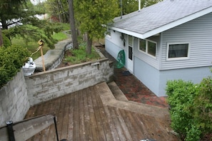 Main entrance from parking area and grilling area.