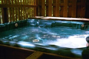 Outdoor Hot Tub over looking the lake.