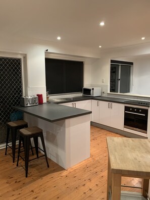 Modern kitchen with breakfast bench