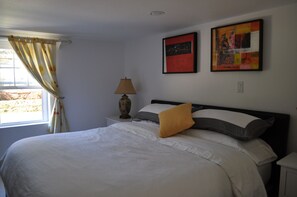 Bedroom: King size bed with one large closet.